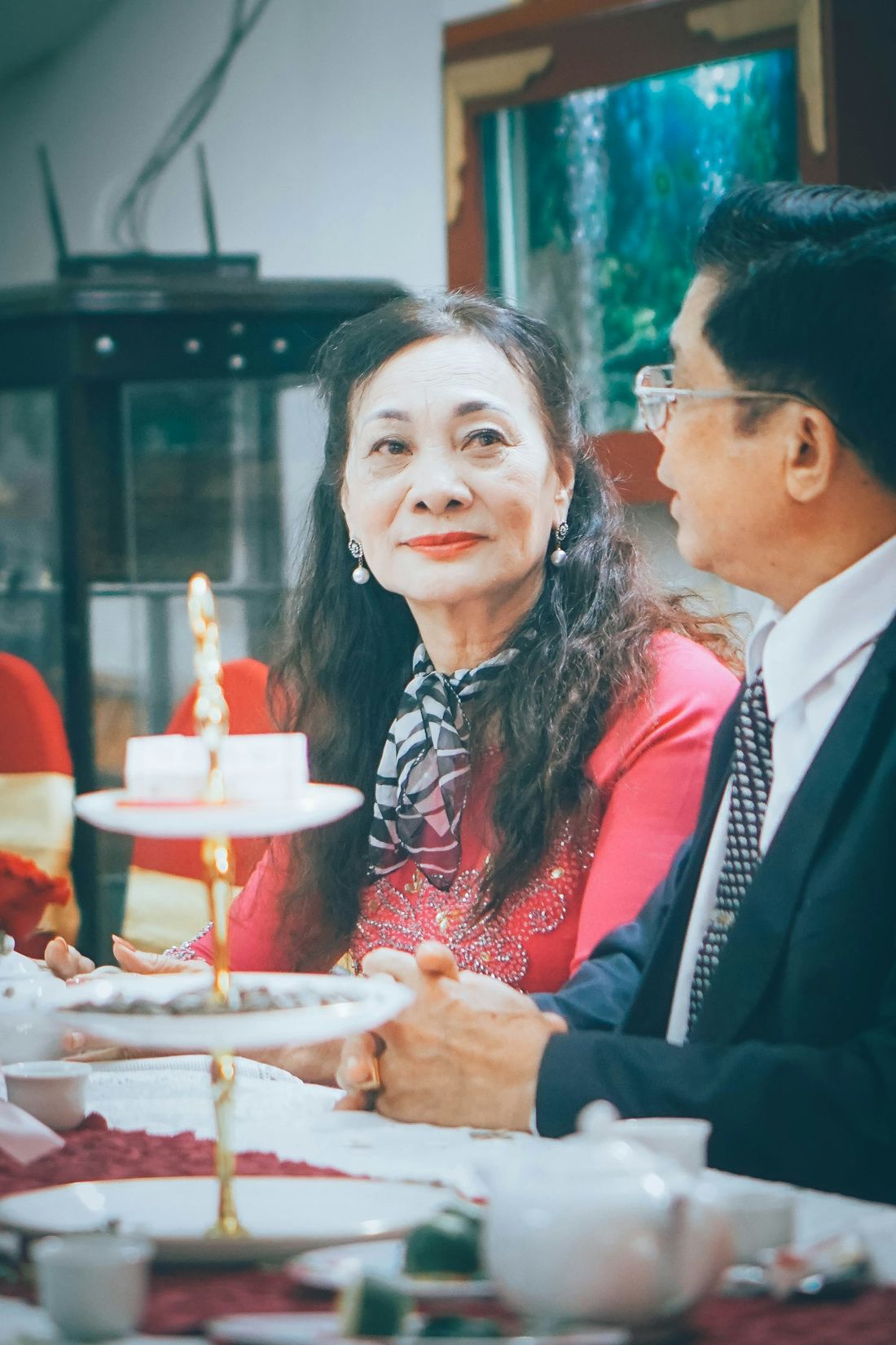 A couple celebrating at an anniversary dinner